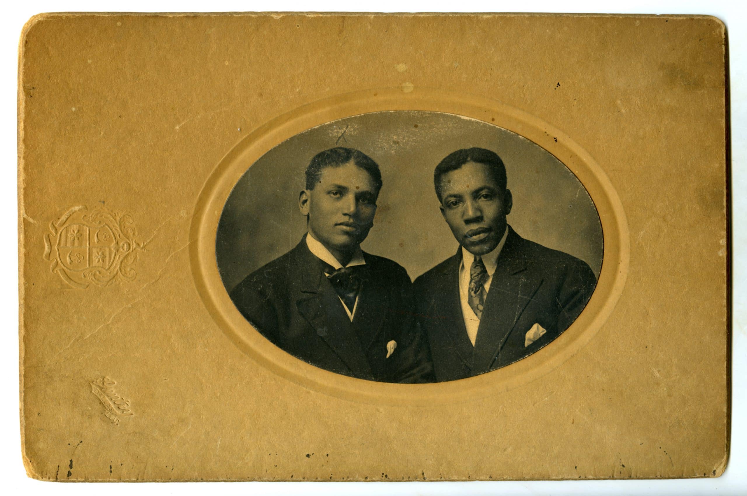 Historic image of Oval portrait of two men in suits