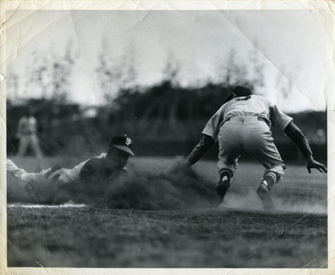 Arthur Page stealing third base in baseball game between the Pointers and Marines