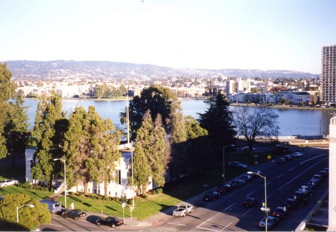 View of Lake Merritt from 13th and Oak Streets, with Fire Alarm building in foreground, circa 2000-2002.