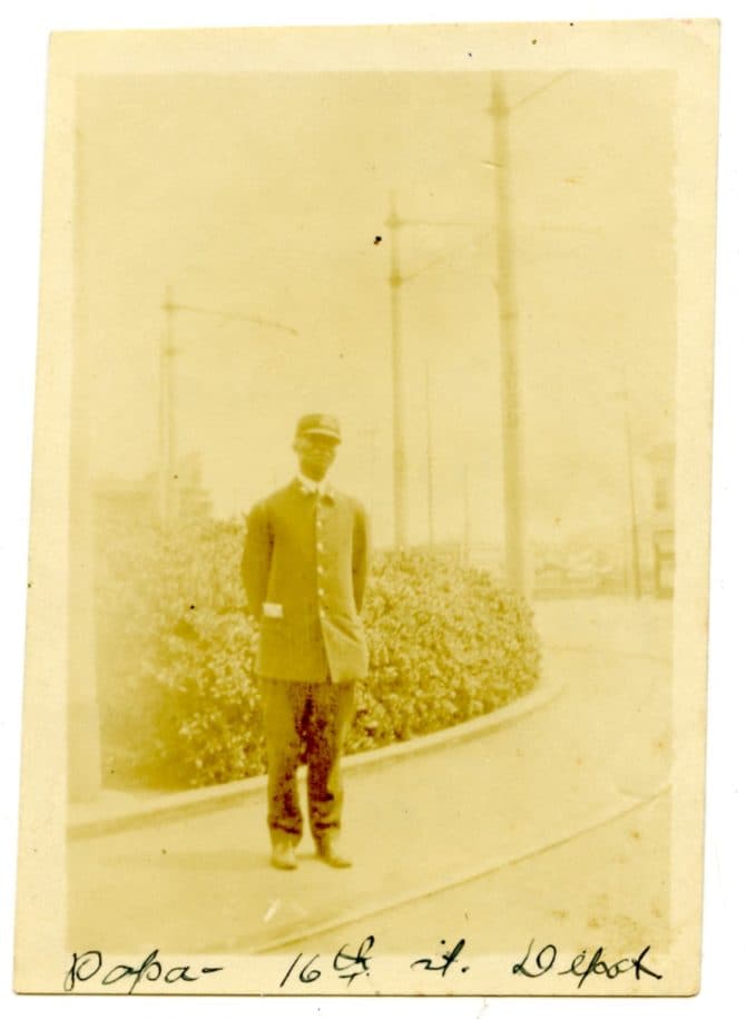 John Davis in Pullman porter uniform standing at 16th St. depot