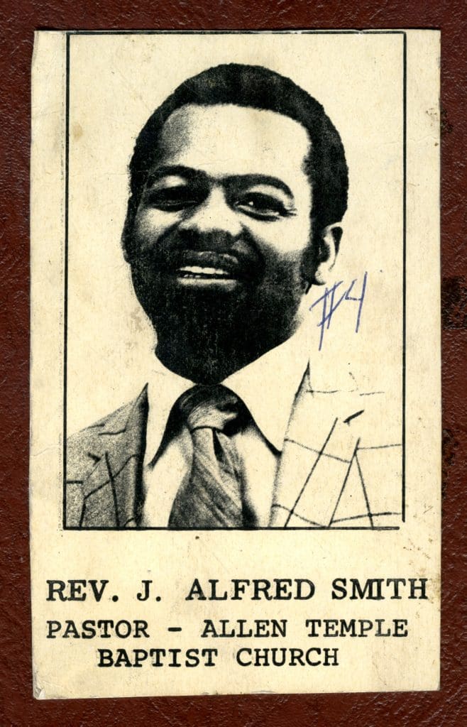 Pasted portrait of James Alfred Smith on cover of scrapbook