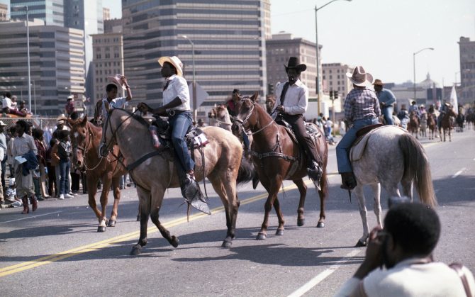 Black cowboys parade through Oakland on horseback