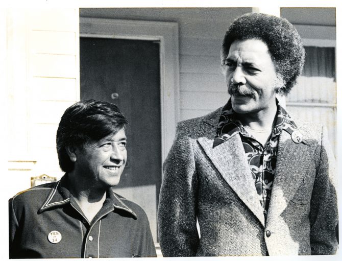 Ronald V. Dellums stands beside Cesar Chavez