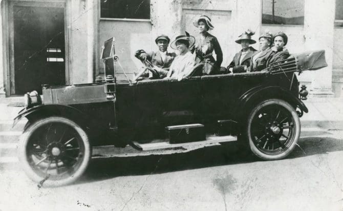 Felix Beckford and group of women sitting in automobile, circa 1920s