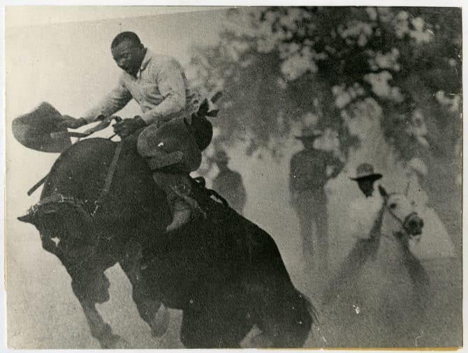 Jesse Stahl rides bucking horse