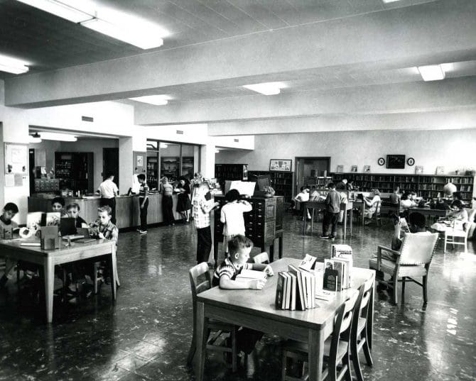 A sixth grade class from Auditorium Village School visting the Children's Room at the third Main Library in 1954. 