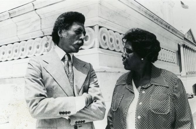 Ronald Dellums and Barbara Jordan speaking outside the U.S. Capitol building