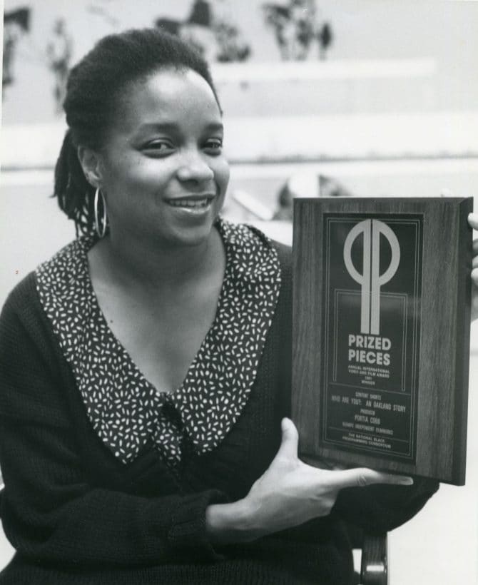 Portia Cobb, Niampo Independent Filmworks, holding first place in content shorts plaque at the National Black Programming Consortium's 11th annual prized pieces International Video and Film Awards