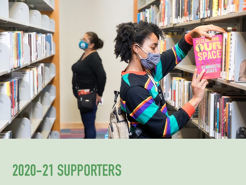 image of person in mask taking book off library shelf, above text reading '2020-21 supporters'