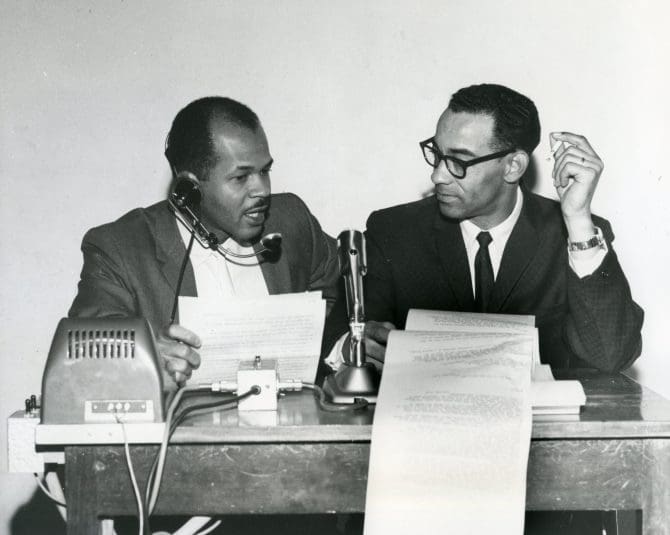 Louis Freeman (left), KDIA News Directory, with Mel Knox, recent addition to the KDIA news staff, circa 1960s