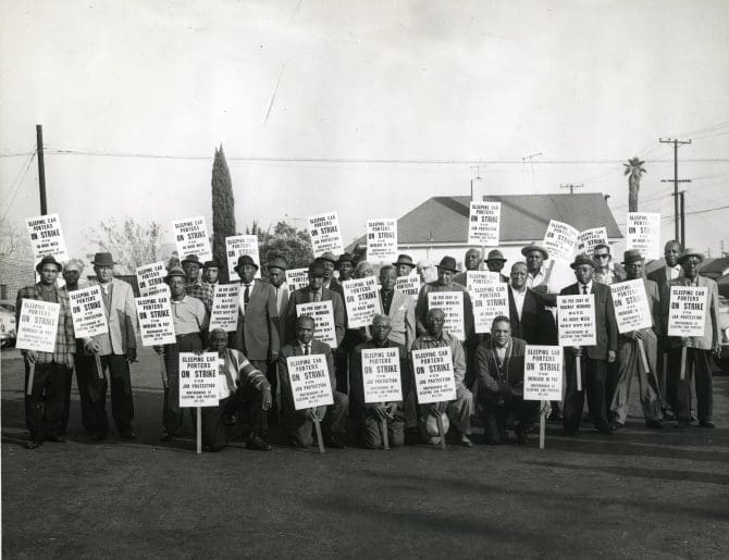 Members of the Brotherhood of Sleeping Car Porters holding picket signs 1963