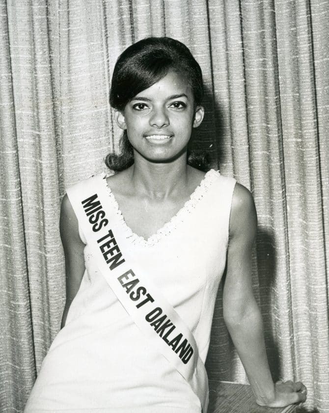 Margaret Jones wearing Miss Teen East Oakland sash, August 22, 1966, Oakland Post Photograph collection, MS 169, African American Museum & Library at Oakland, Oakland Public Library.