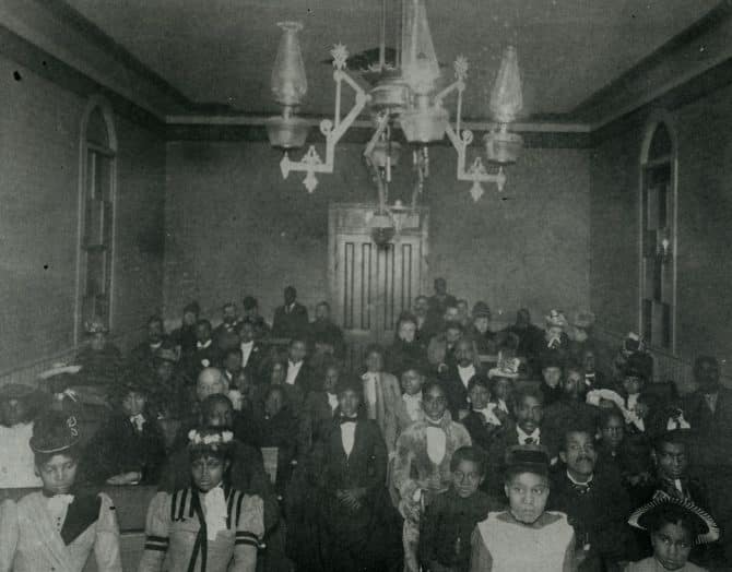 Congregation seated in pews inside church, San Jose, California