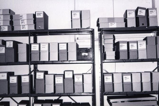 Archival boxes on shelves