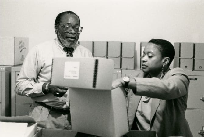 Looking at archival boxes at the Northern California Center for African-American History & Life