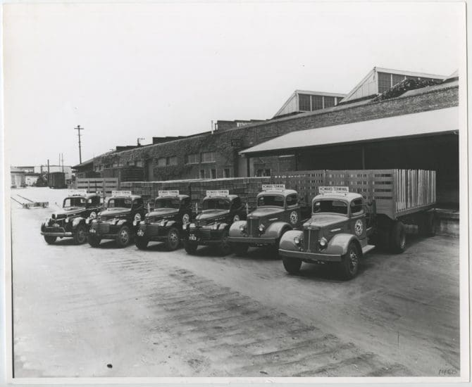 Howard Terminal delivery trucks line up at Warehouse no. 6.