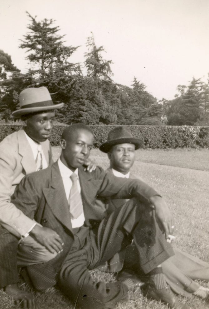 Three sitting on grass in Golden Gate Park, San Francisco, circa 1940s