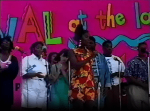 Image from a video of the Festival at the Lake's 1992 Young Artists Stage, showing teenagers singing.