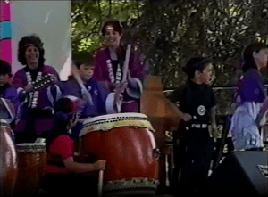 Image from a video of the Festival at the Lake's 1992 Young Artists Stage showing children playing taiko drums.