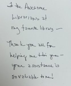Note that reads: "To the awesome librarians at my favorite library, thank you all for helping me this year, your assistance is so valuable to me!"