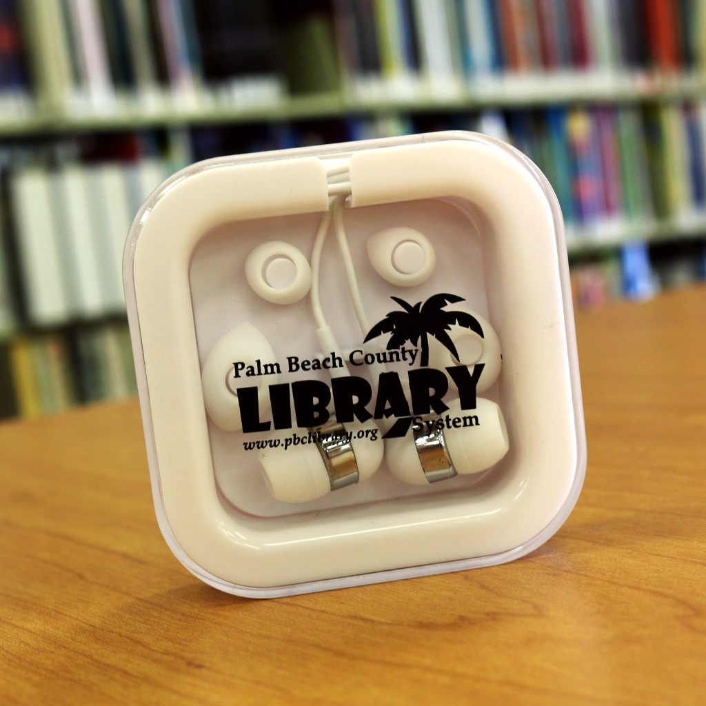 White wired ear buds with Palm Beach County Library System logo