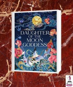 Daughter of the Moon Goddess cover on red marble background