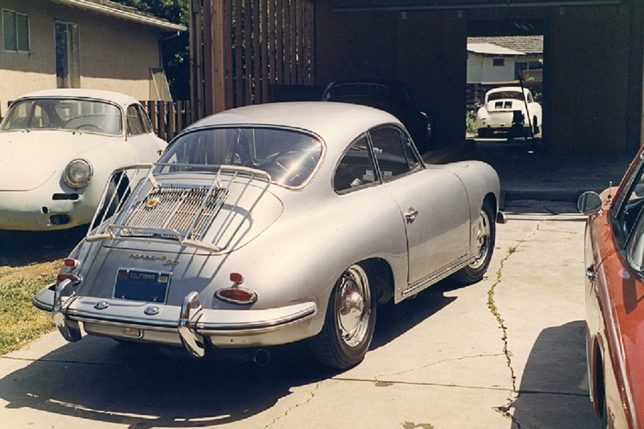 Image: A customer's 356 Porsche is parked in front of the new drive-through double garage. Photo by Dean Pfundstein