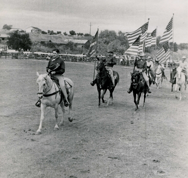 Association President Ralph Phillips leads a procession on the Los Gatos Gymkhana Grounds in the 1940s.