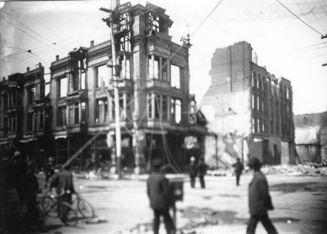 View of the corner of Second Street and San Fernando Street. Site of the earthquake-damaged and burned out Louise Building and Dougherty Building.