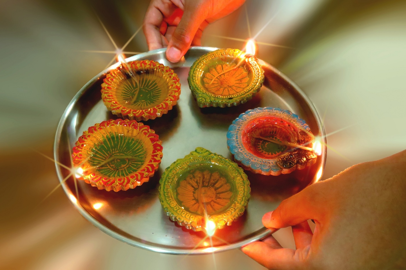 A tray of five diyas (oil lamps)