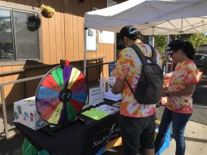 people at randalls outreach table