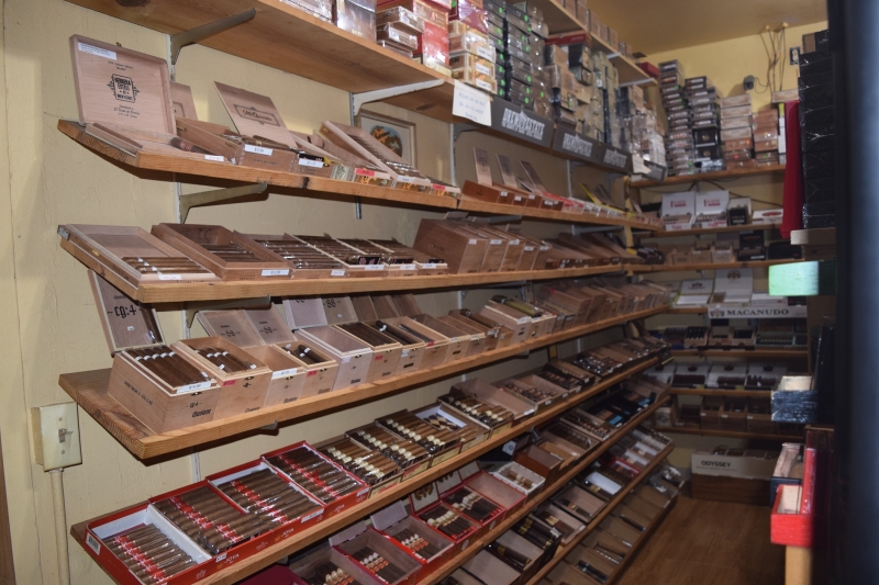 Humidor with shelves of cigars at West Coast Cigars.