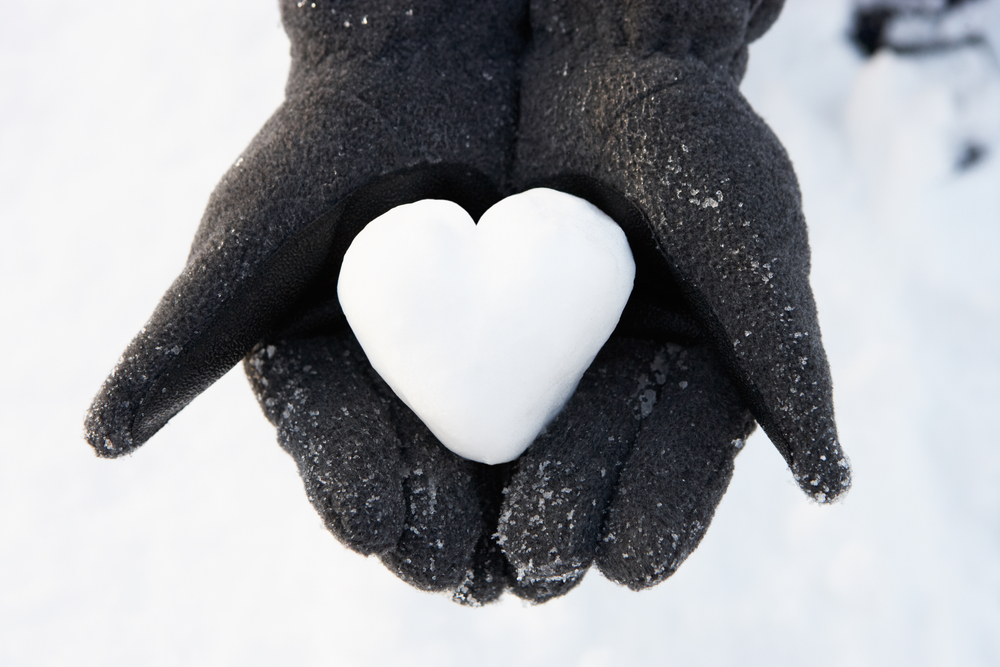 black gloves-and-heart shaped snowball