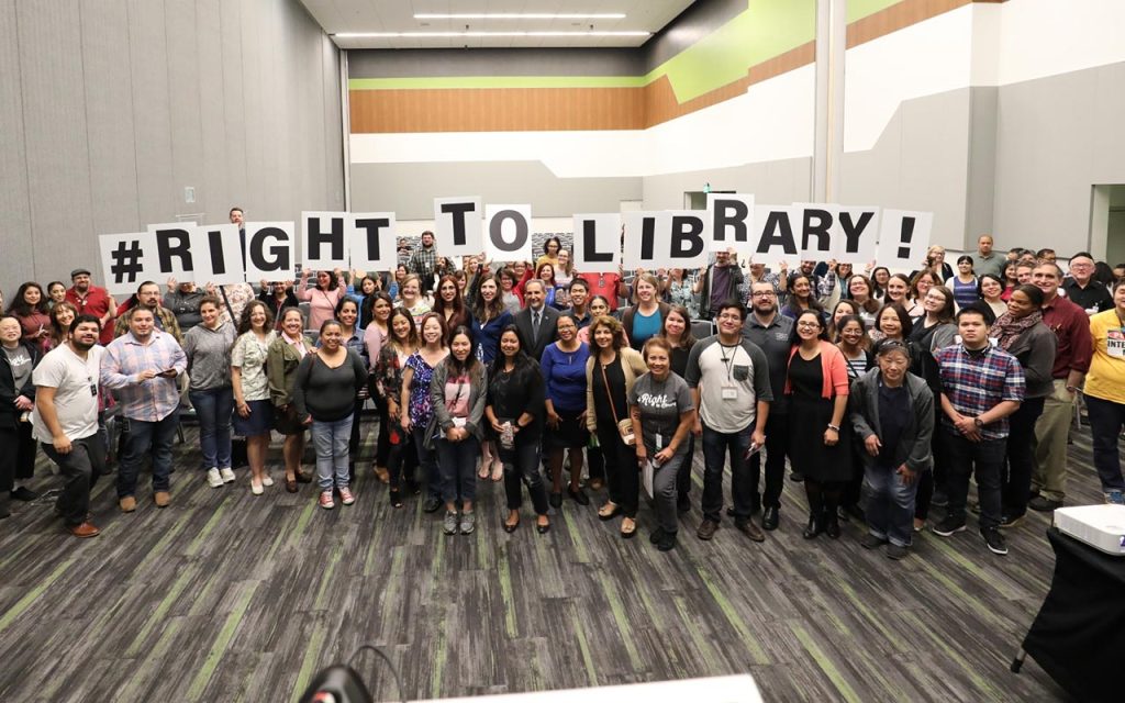 SJPL staff holding up letters that read, #RightToLibrary