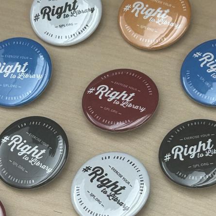 Colorful button pins that say Right to Library.