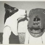 Two grotesque dog heads. Source: Chicago Park District Records: Photographs, Image 005_002_003
