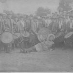 group of men and women with drums