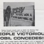 Ramona Rickett stands next to Mobil Oil Victory Sign at the South East corner of Madison and Central; People Victorious! Mobil Concedes!!! On July 10th Judge Healy denied Mobil Oil's request for a "variance" so they could put up a gas station at Madison and [text ends]
