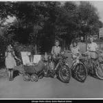 Children with bicycles and a baby buggy in Hamlin Park