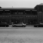 The Chinatown Branch with cars parked out front.
