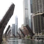Draw bridges raise over the Chicago River