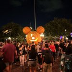 Large pumpkin Mickey statue at night