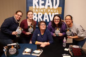 Meg Medina signs copies of her book at Rondo Community Library (February 20, 2019)