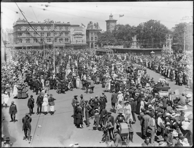 Crowd in Cathedral Square, Christchurch, celebrating Armistice Day. Head, Samuel Heath, d 1948 :Negatives. Ref: 1/1-007108-G. Alexander Turnbull Library, Wellington, New Zealand. https://natlib.govt.nz/records/22898377