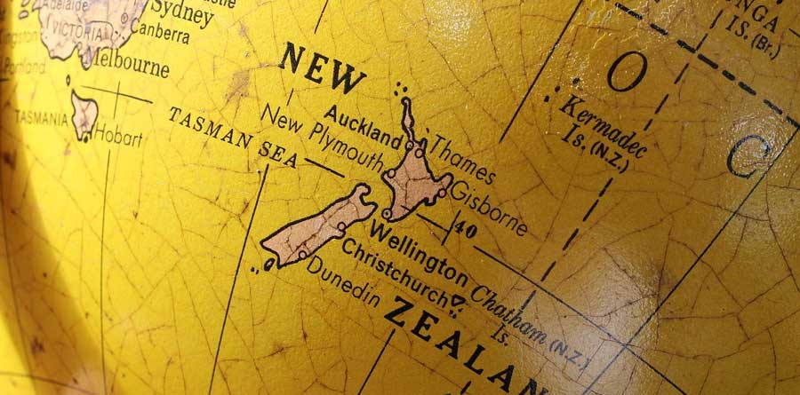 Photo of a vintage globe showing New Zealand