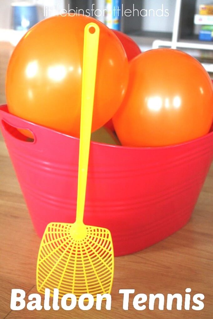 balloons in a basket and plastic swatter