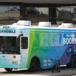 Library bookmobile on Jacome Plaza in front of Joel D. Valdez Main Library