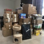 1,564 pounds of donations (stacks of boxes)
