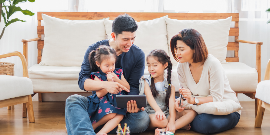 family reading using tablet
