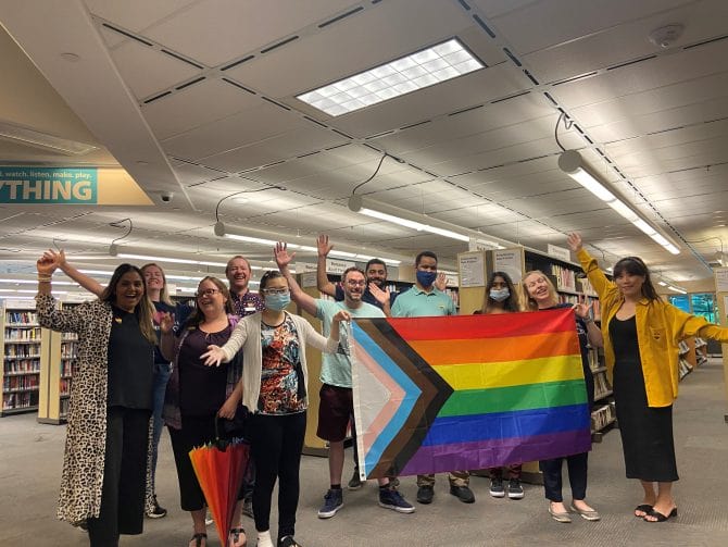 Image of staff with the Pride Flag